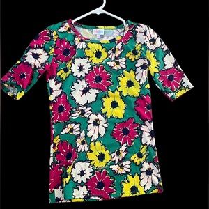 LuLaRoe XXS Pink yellow and white floral shirt on green